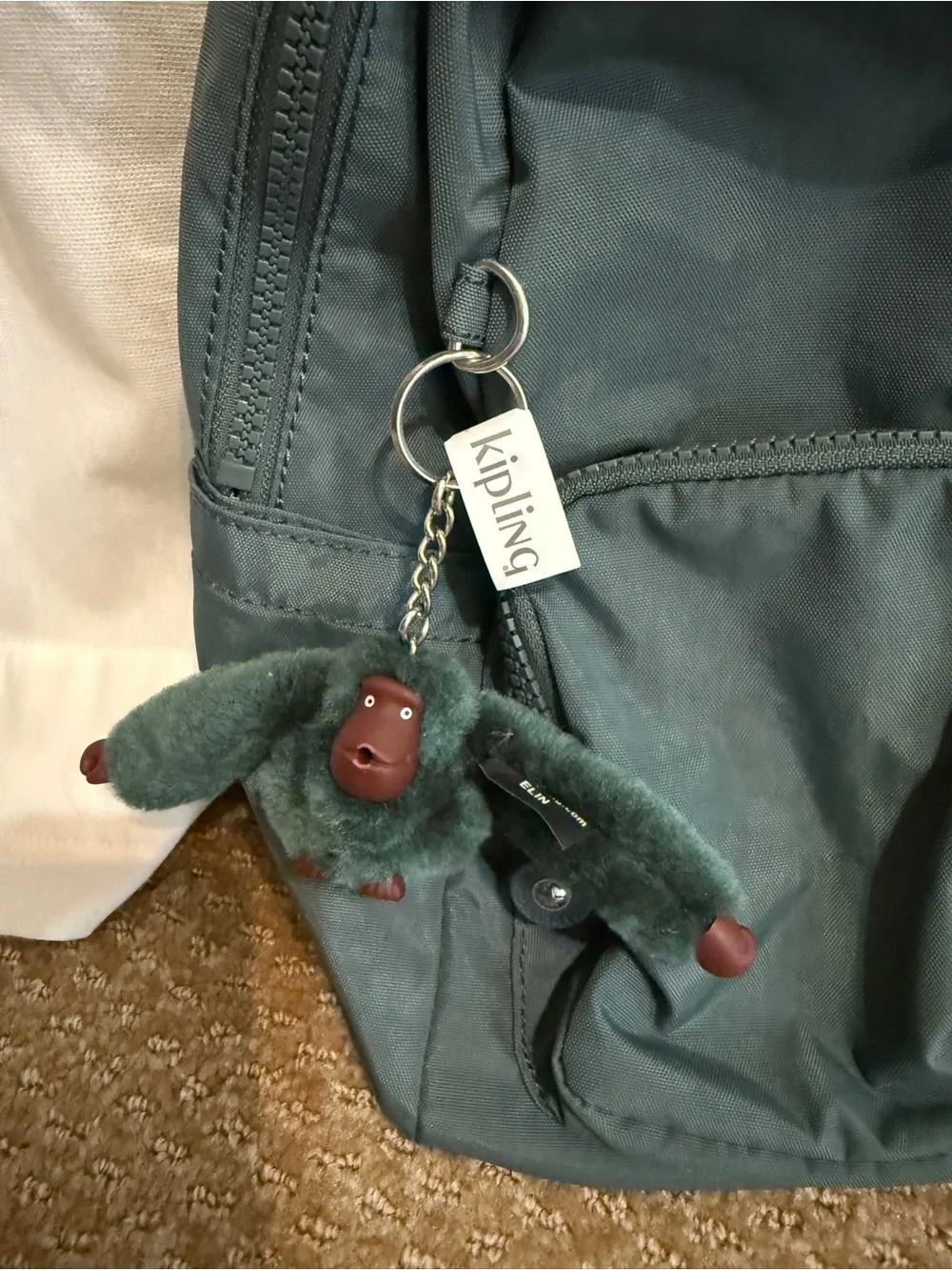 Kipling Fiona Green backpack with Monkey Charm